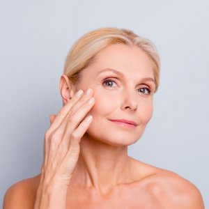 Elevation Med Spa - Dermal Fillers Benefits older woman with minimal make up with healthy skin