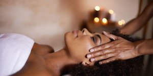 Elevation Med Spa Lone Tree Colorado woman enjoying relaxing massage on scalp