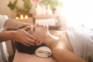 Elevation Med Spa Lone Tree Colorado woman enjoying head massage at spa